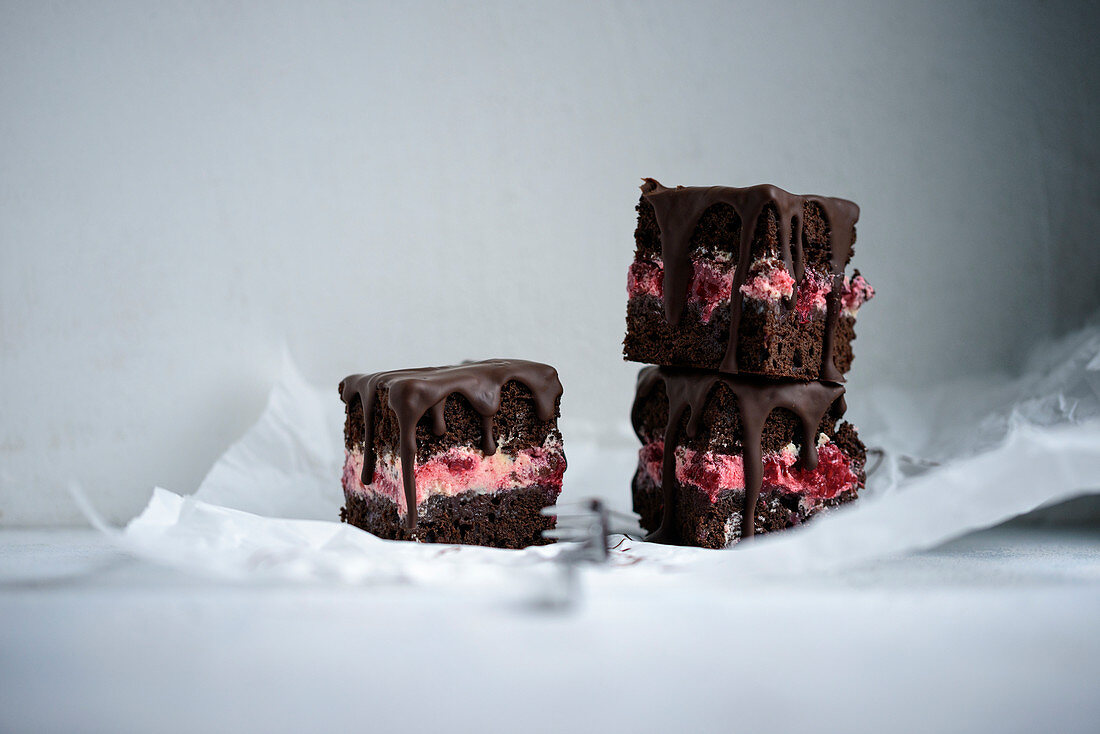 Vegan chocolate cake with buttercream and raspberries