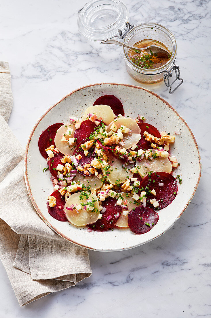 Beetroot carpaccio with Harz cheese with apples and walnuts