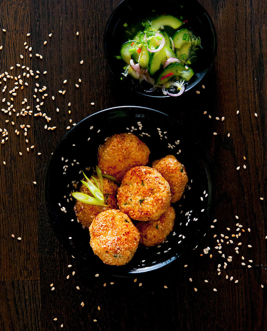 Oriental sesame seed fritters with cucumber salad