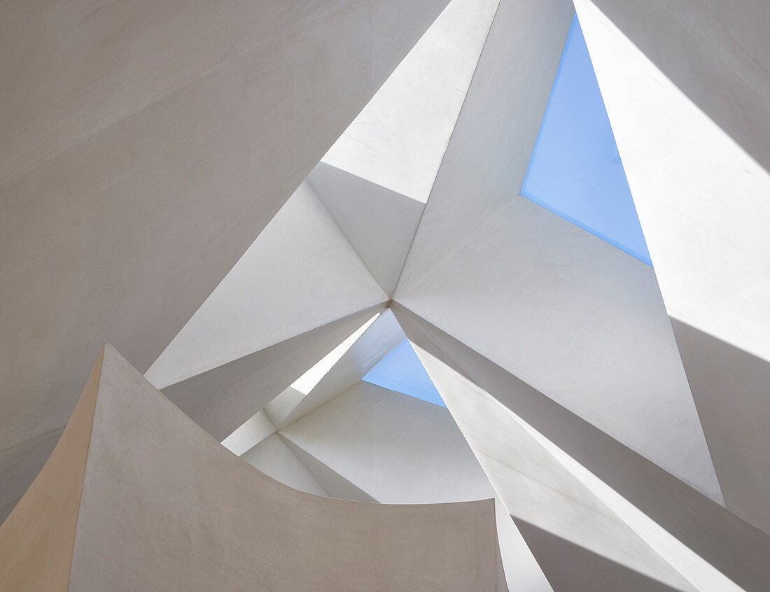 Faceted ceiling with triangular skylights