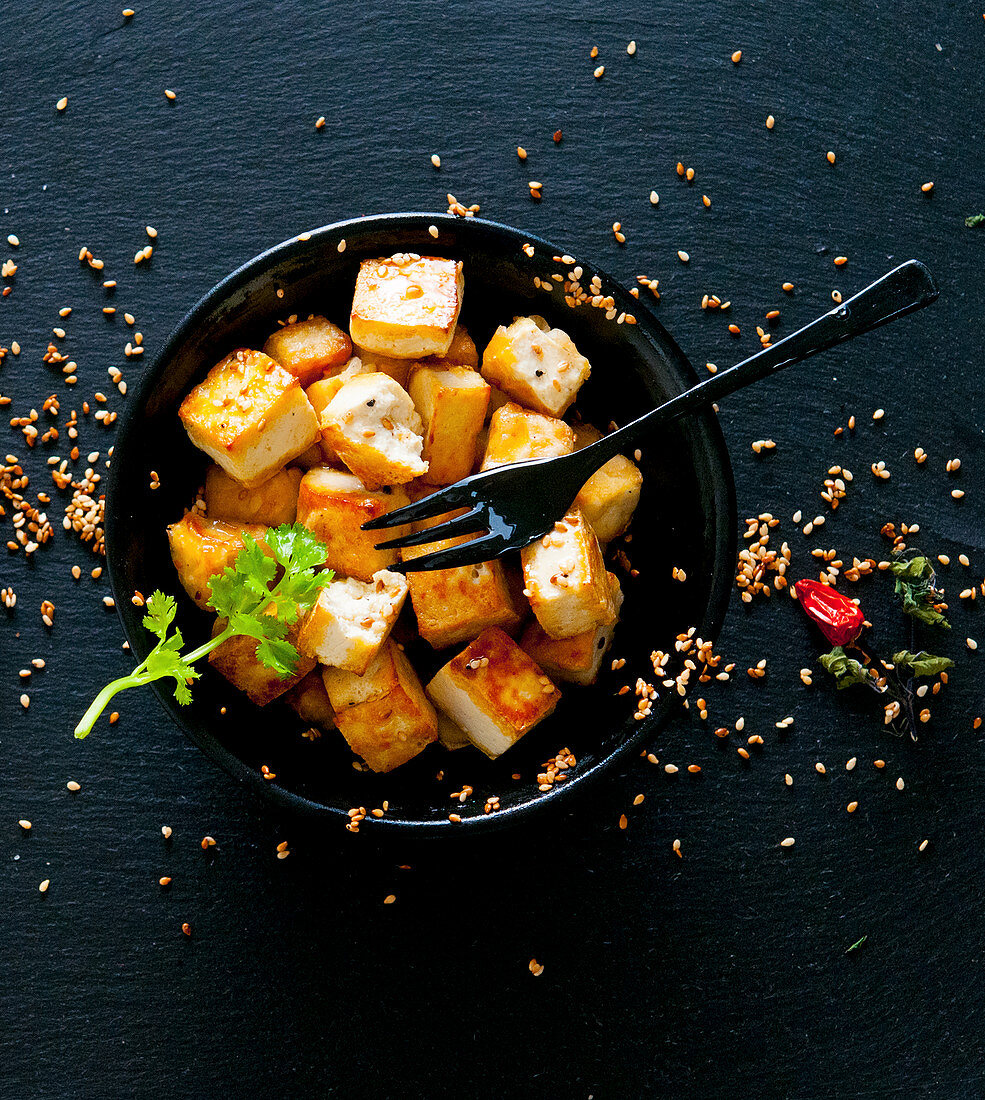 Fried tofu with sesame seeds