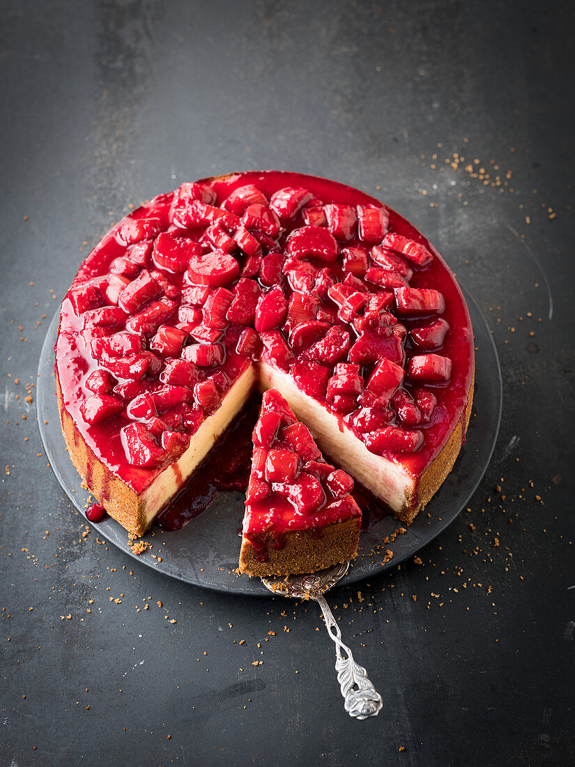 Rhubarb and raspberry cheesecake, sliced