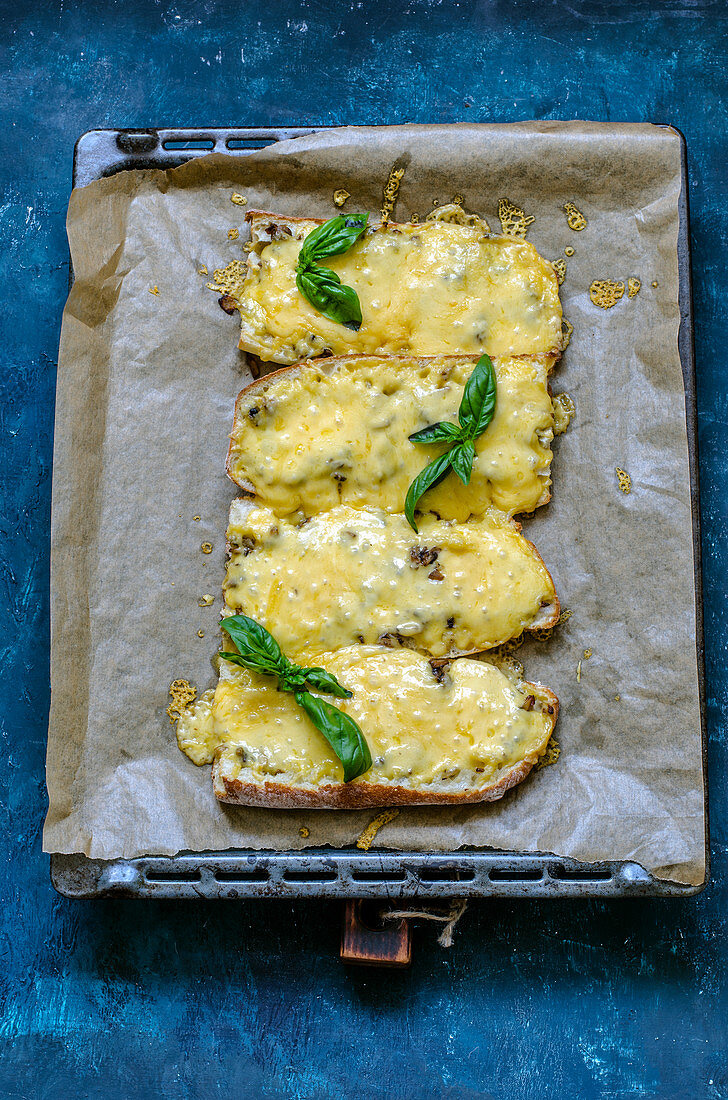 Baguette bruschetta with cheese, baked in the oven