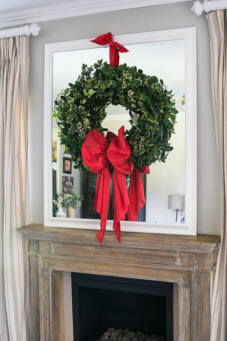 Ivy wreath tied with red ribbon