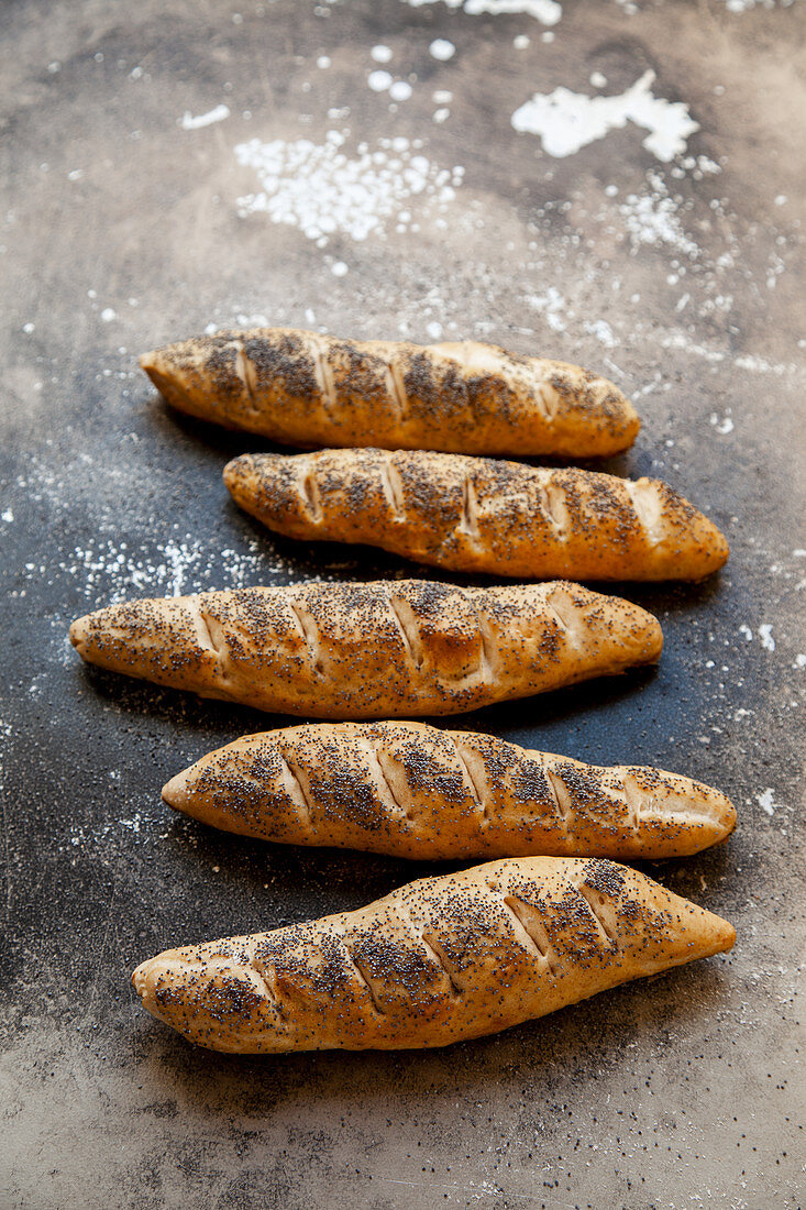 Lye baguettes with poppyseeds