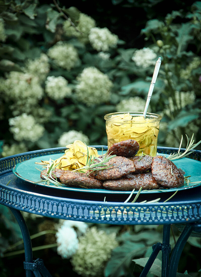 Spiced grilled meatballs with courgette relish