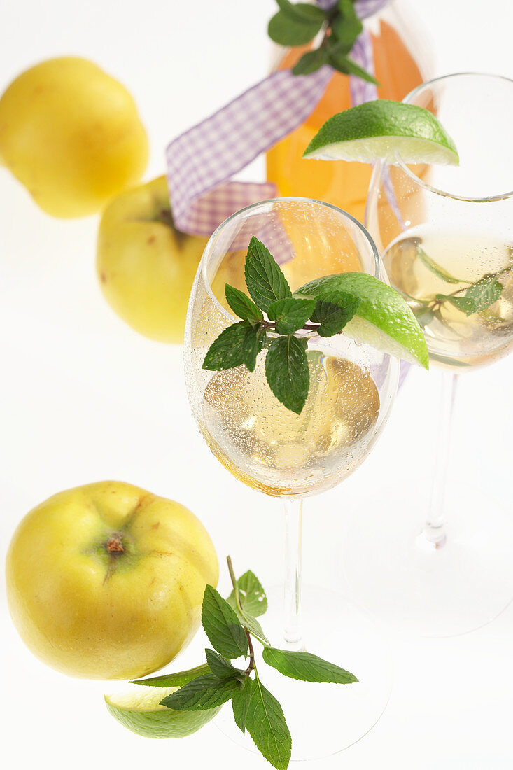 Homemade quince liqueur with fresh fruit