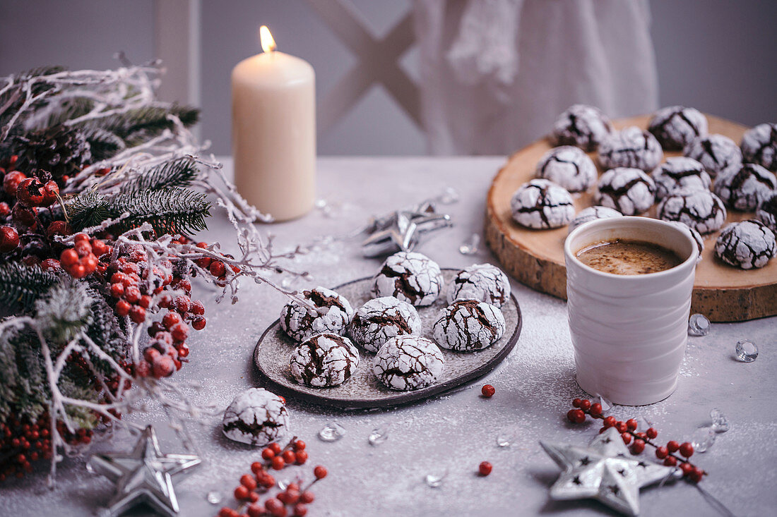 Chocolate crinkle cookies served on a ceramic plate in festive Christmas styling