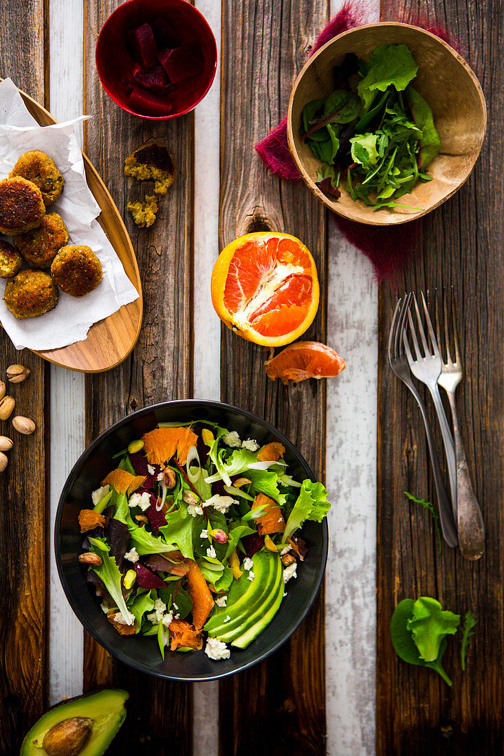 A winter salad with oranges, avocado, pistachios, beetroot and feta cheese