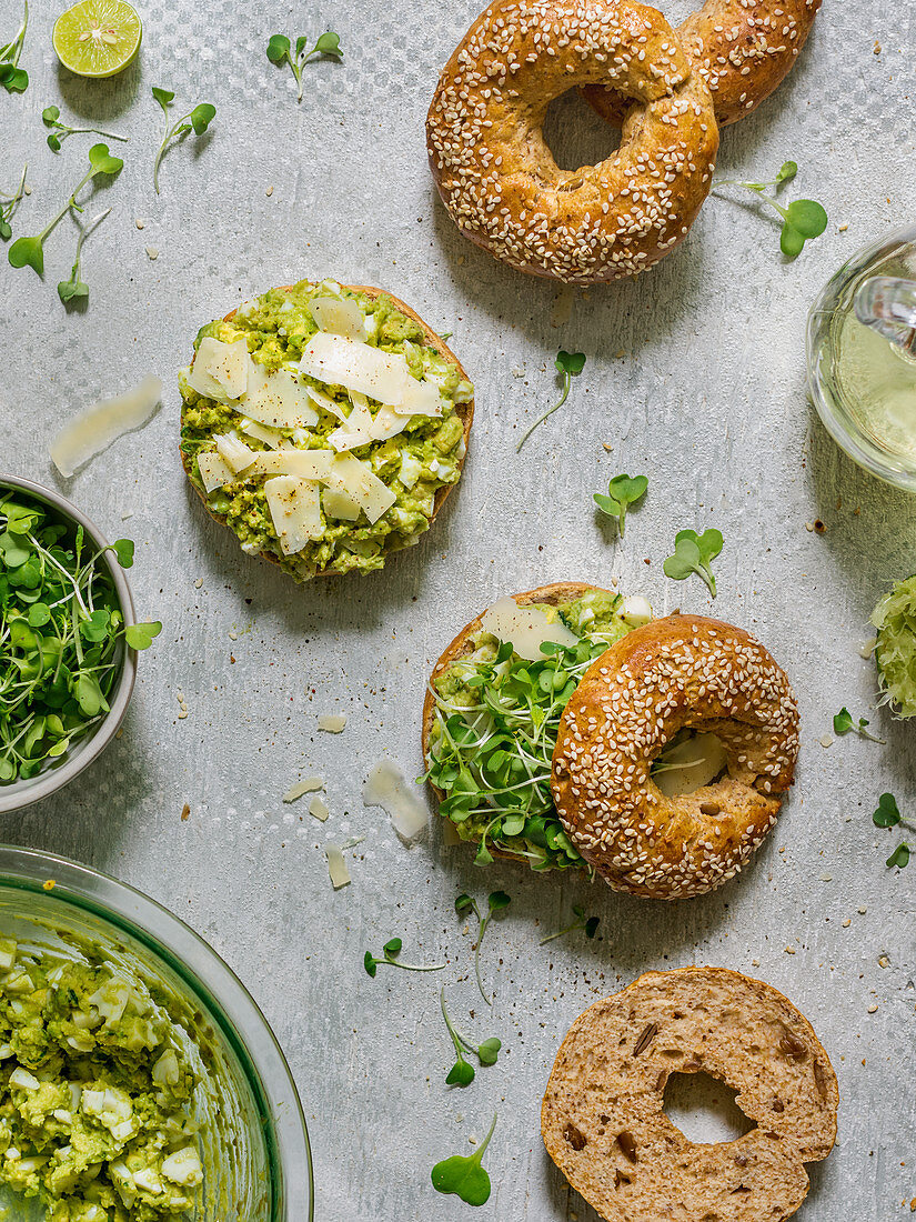 Home made bagels with egg salad, parmesan and microgreens