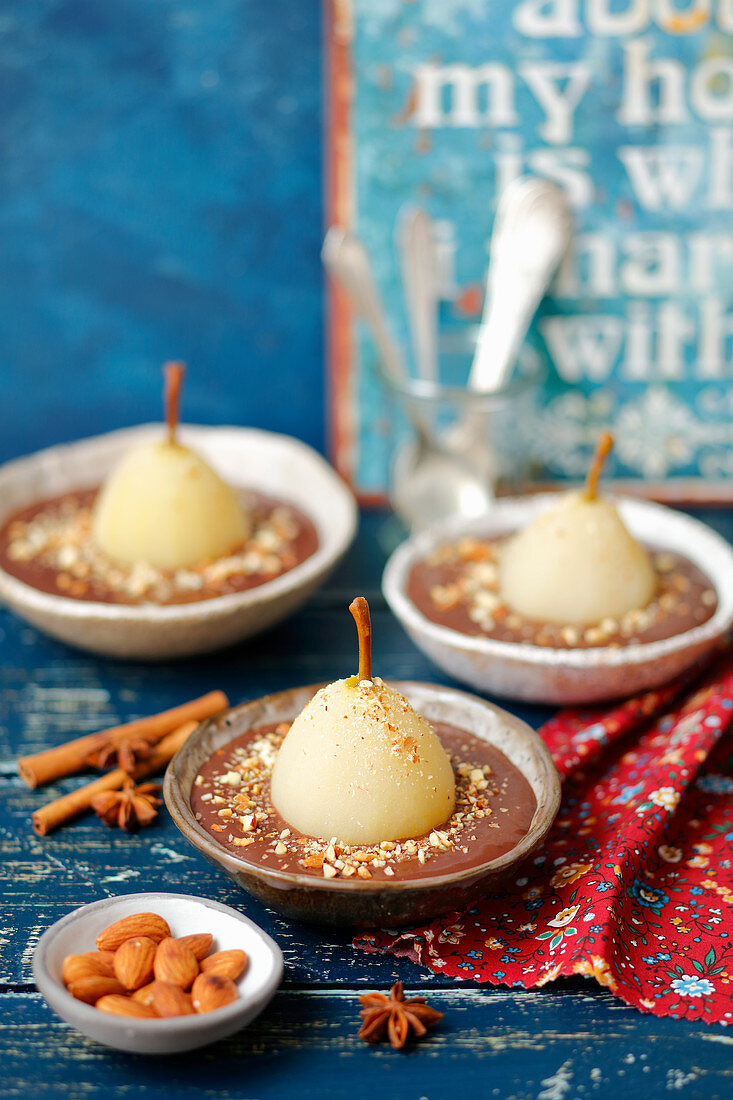 Poached pears in caramel sauce