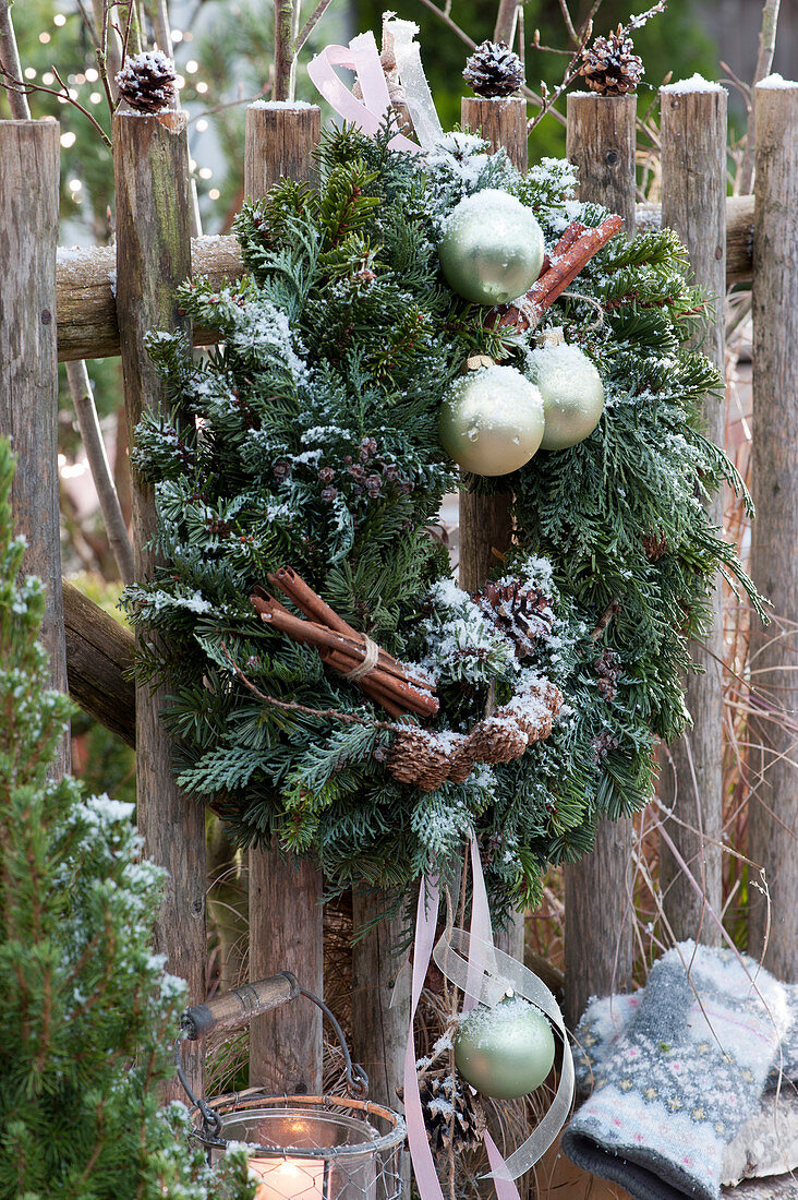 Christmas wreath on the garden fence
