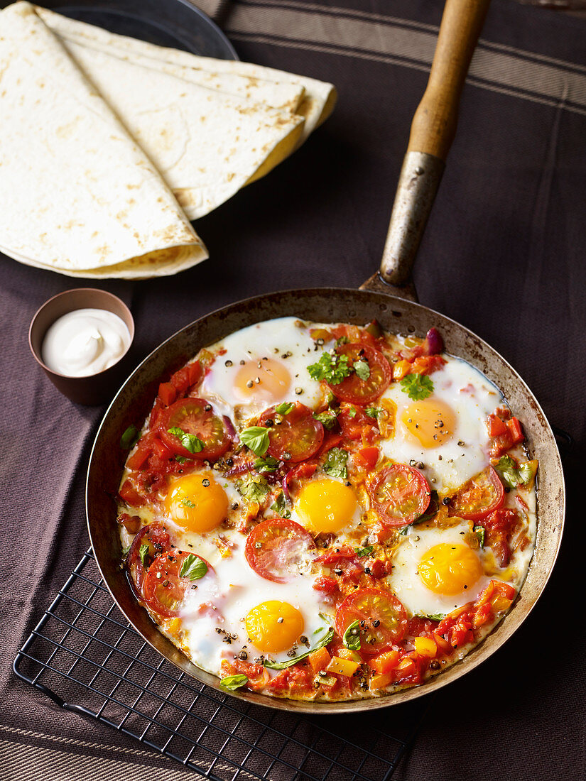 Mexican breakfast eggs with peppers and tomatoes
