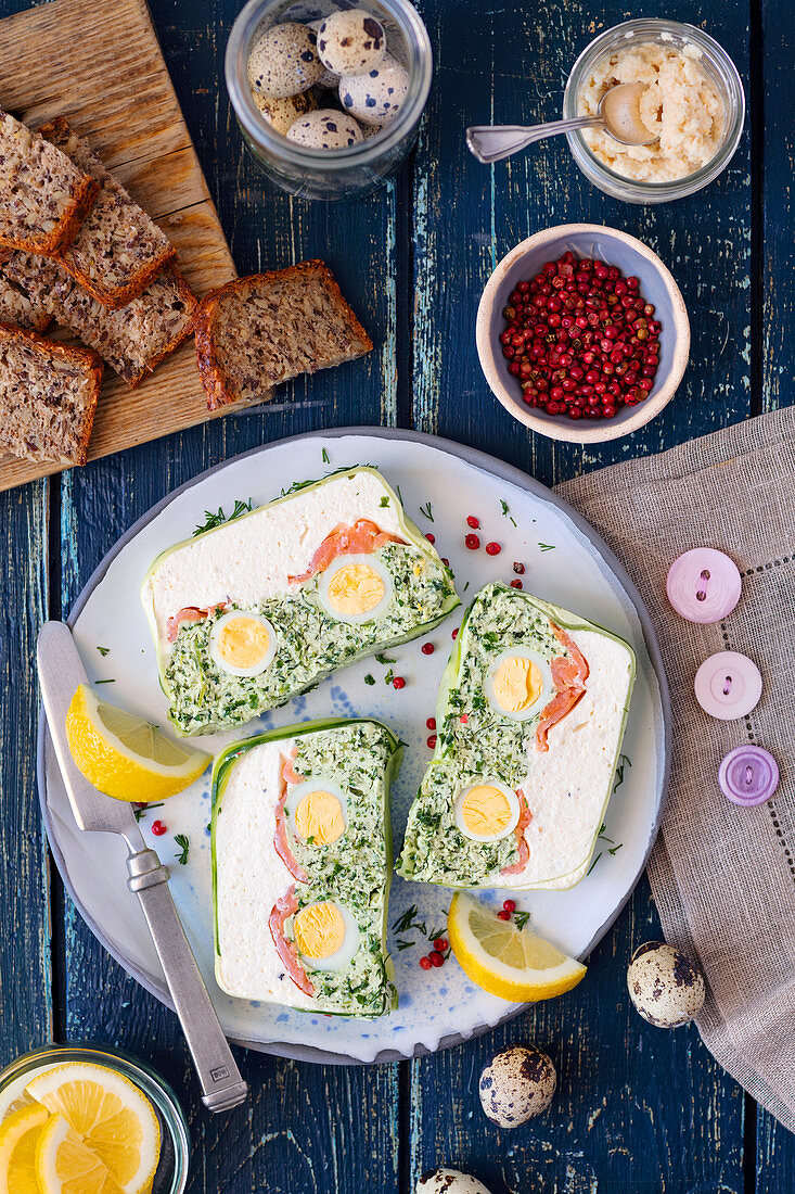 Cream cheese terrine with quail eggs, salmon and cabbage
