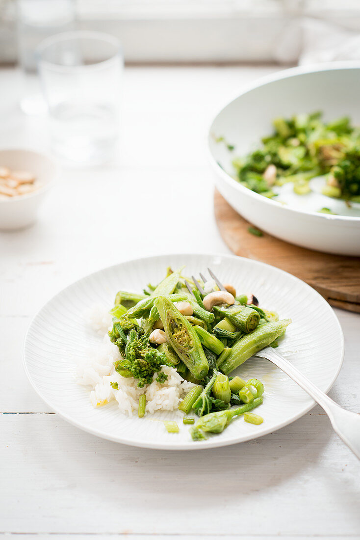 Sauteed wild herbs with rice and almonds