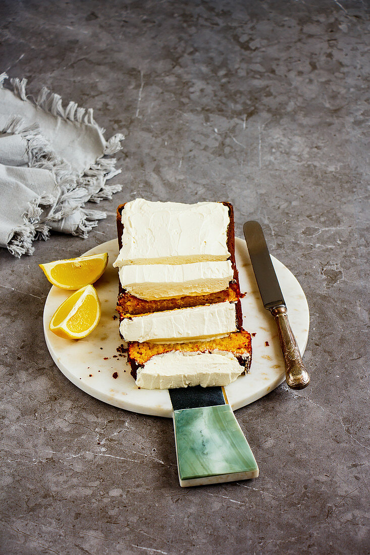 Freshly baked lemon cake dessert with mascarpone cream