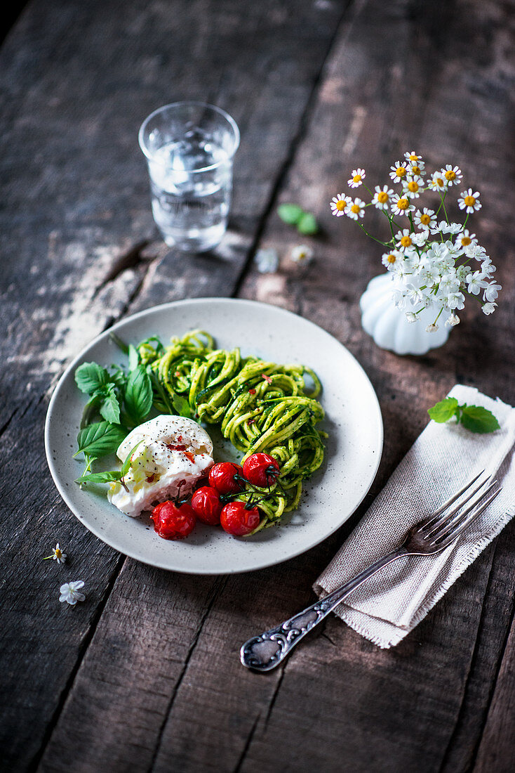 Zoodles with pesto, oven-roasted tomatoes and buffalo mozzarella