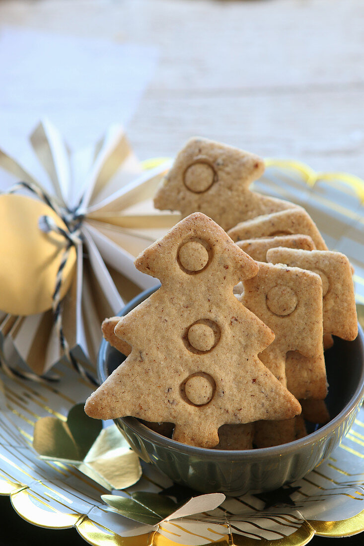 Gluten-free shortbread biscuits shaped like Christmas trees