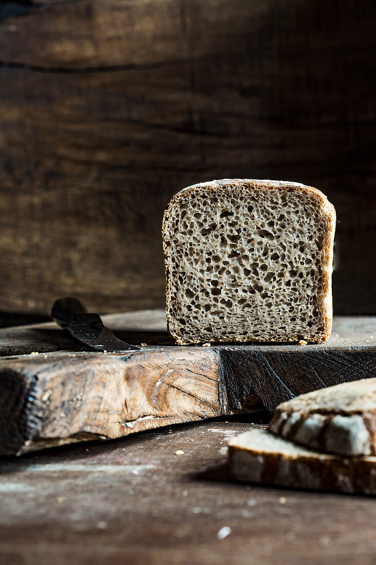 Rye bread, sliced on a wooden board