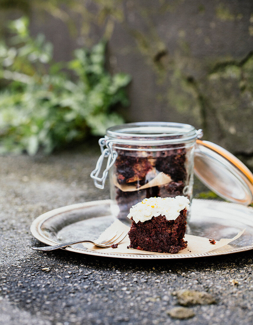 A beetroot brownie with orange zest and cream