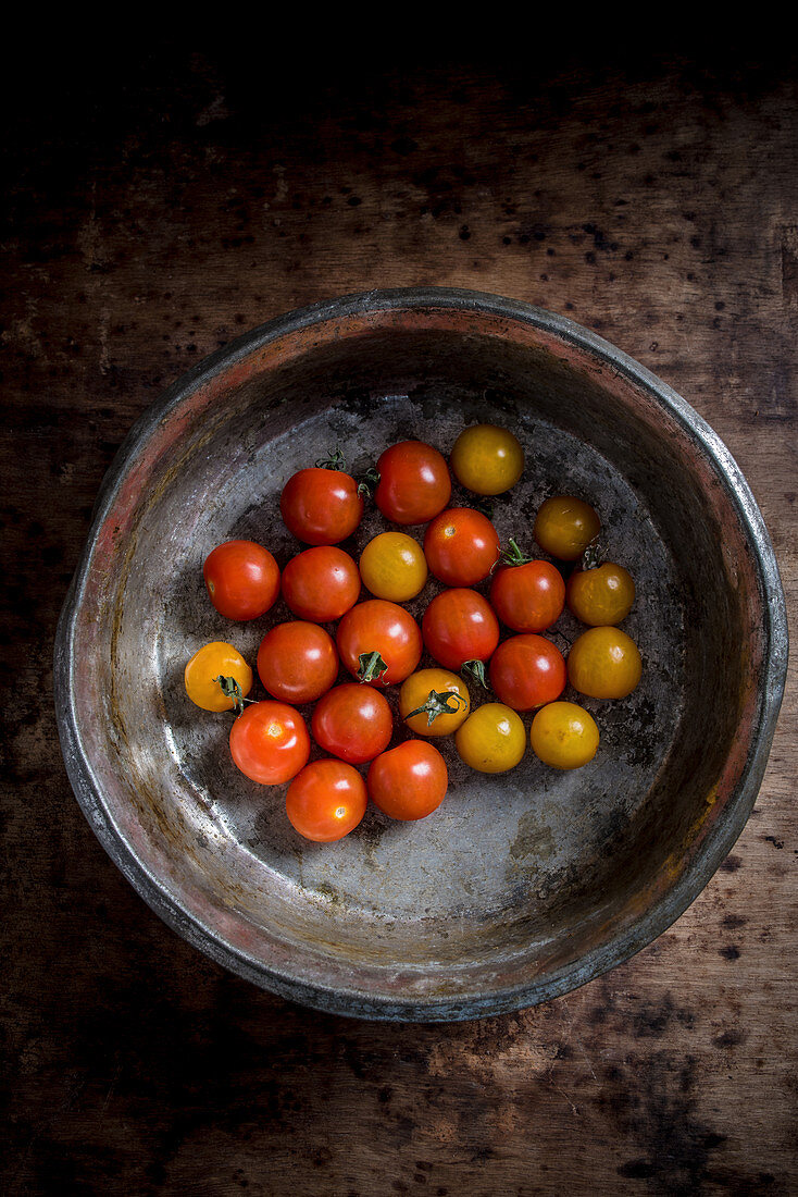 Cherry tomatoes in a ceramic bowl