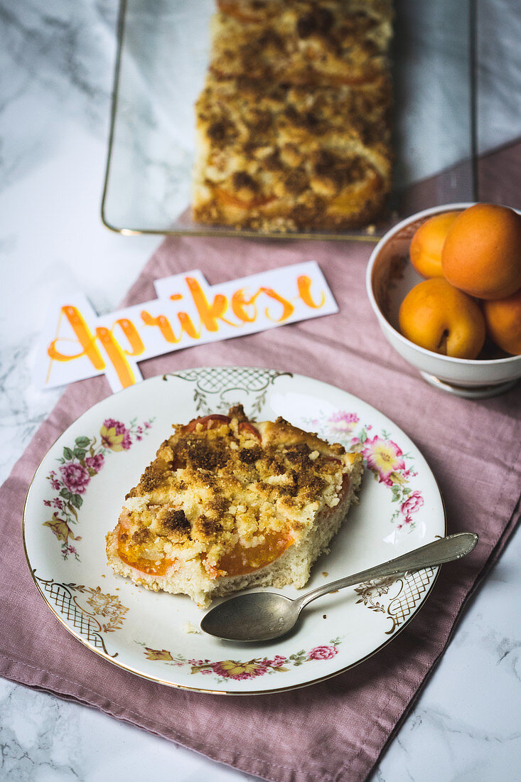 A slice of apricot crumble cake