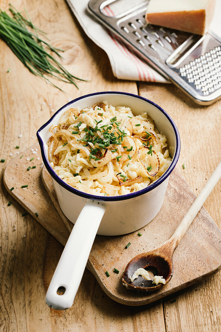 Cheese Spätzle (soft egg noodles from Swabia) with chives and onions
