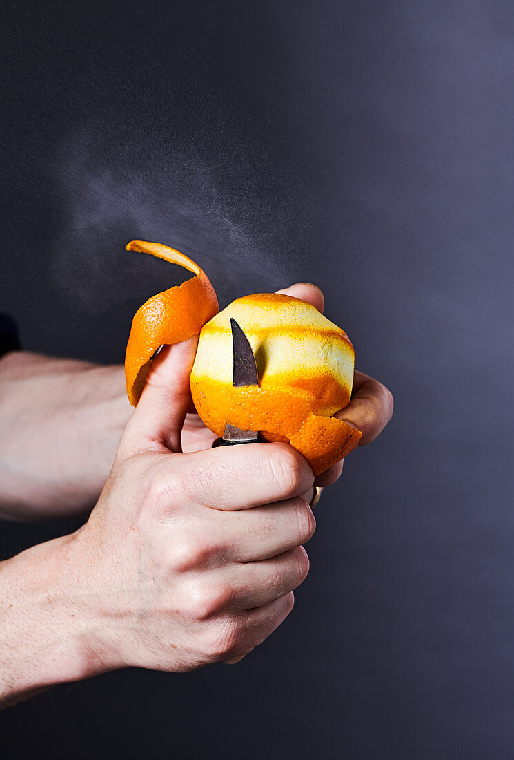 Peeling an orange