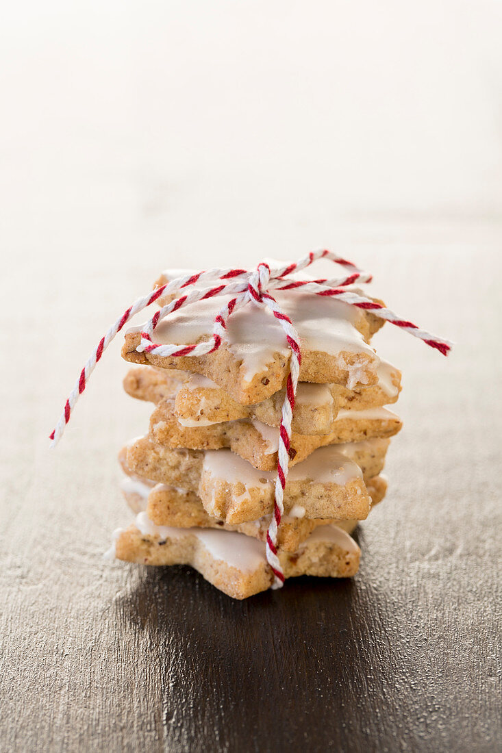 A stack of cinnamon stars tied with string