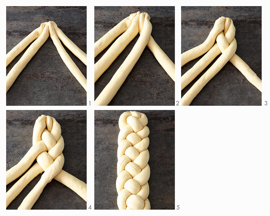 A four-strand braided bread plait being made