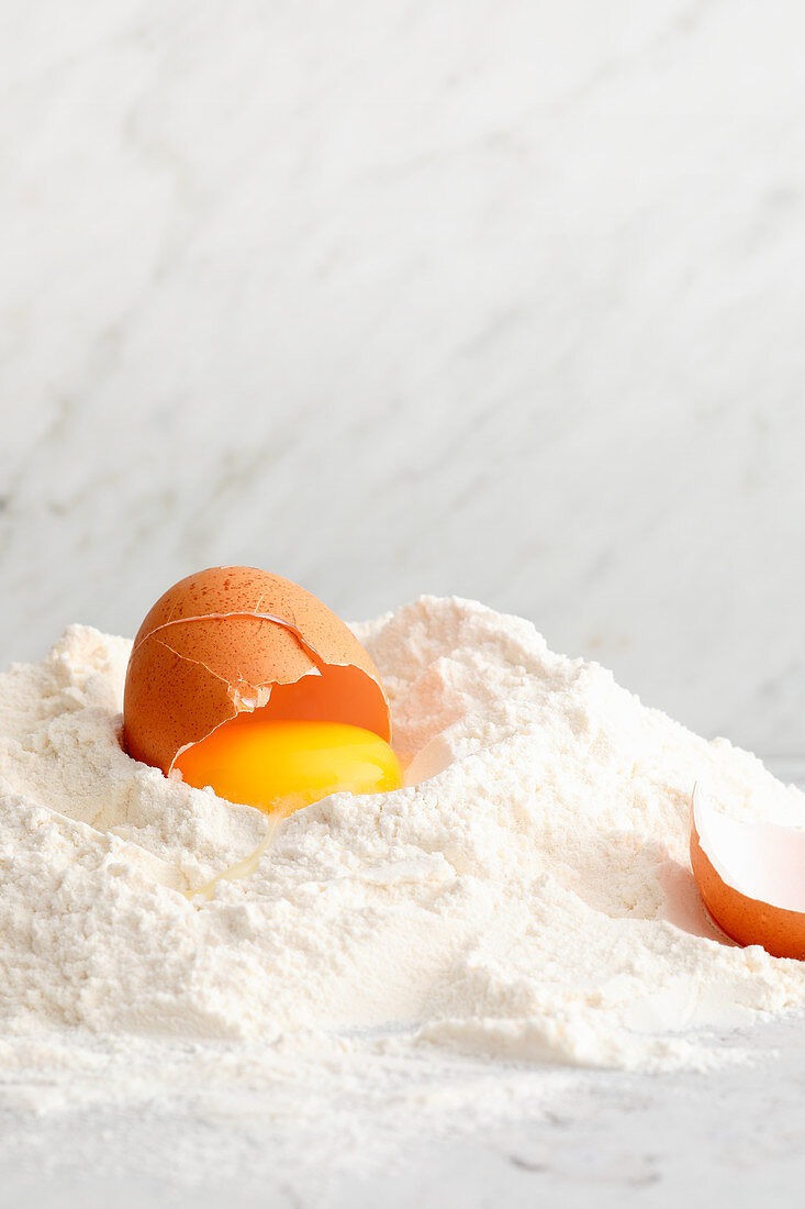 A egg on a pile of flour