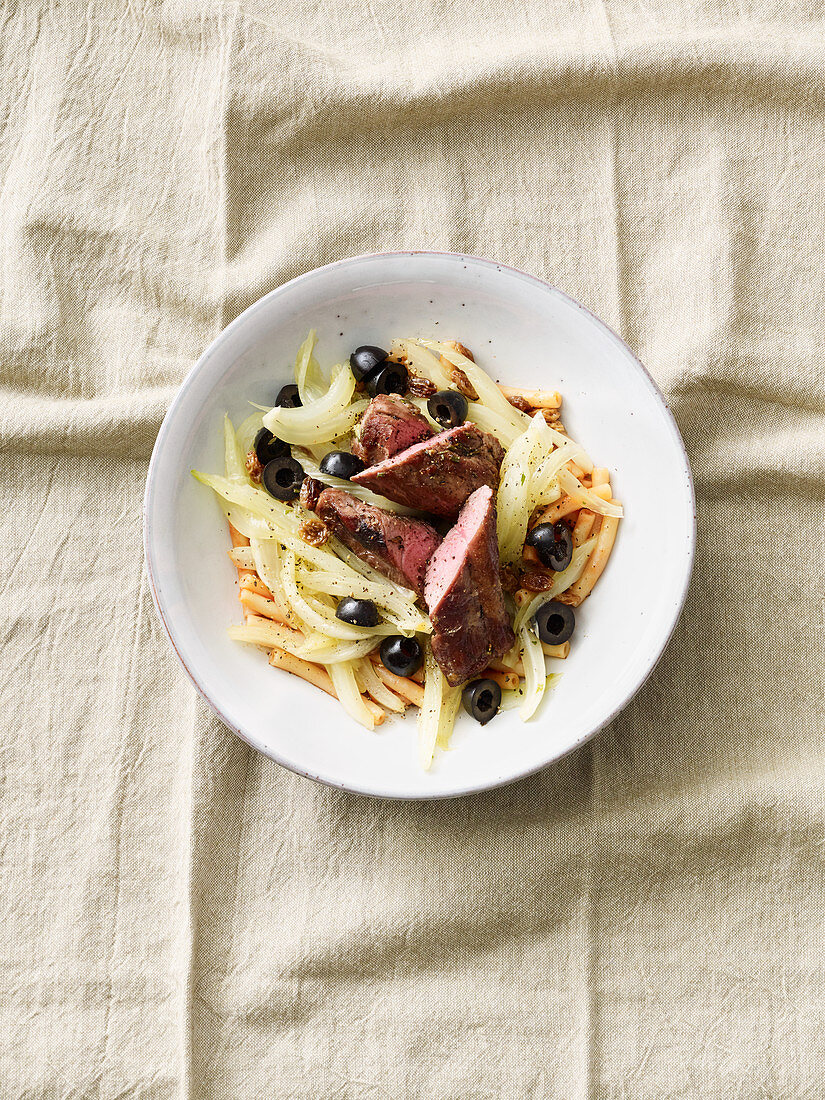 Lamb fillet with a fennel and olive medley
