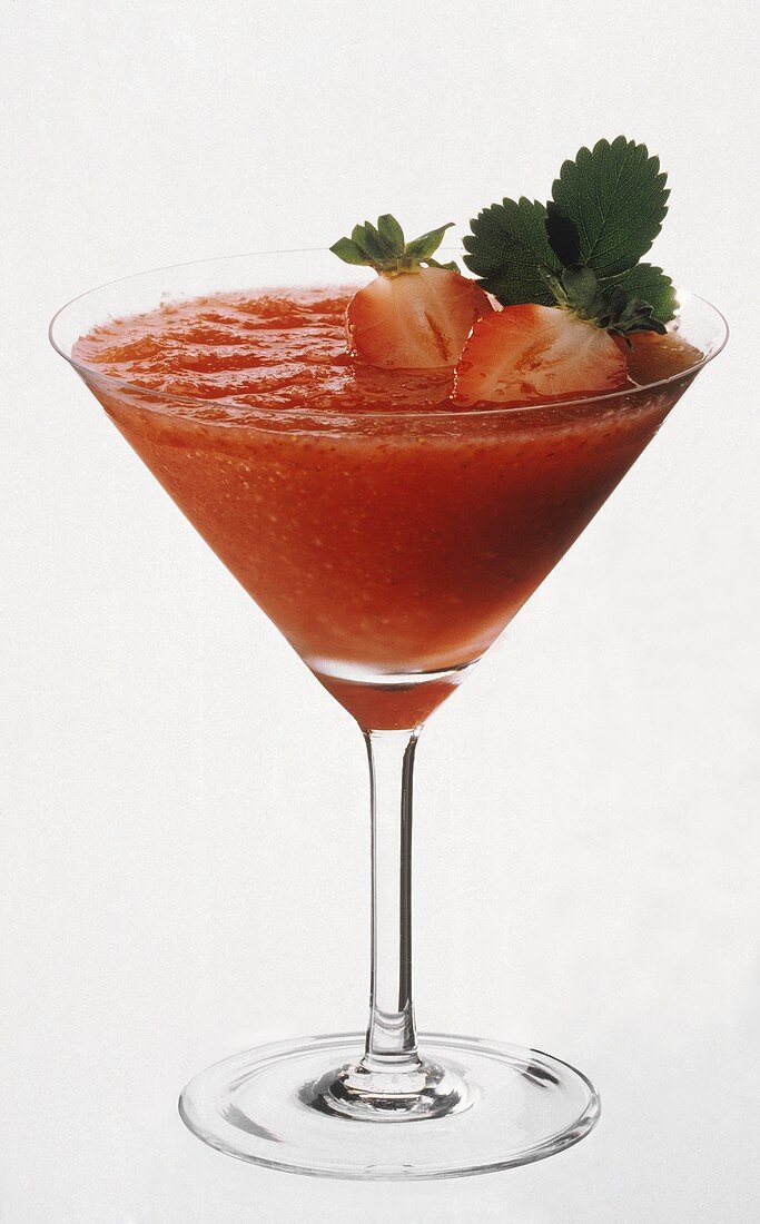 A glass of strawberry daiquiri