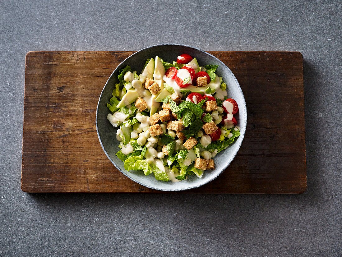 Caesar tofu salad with broad beans and mint