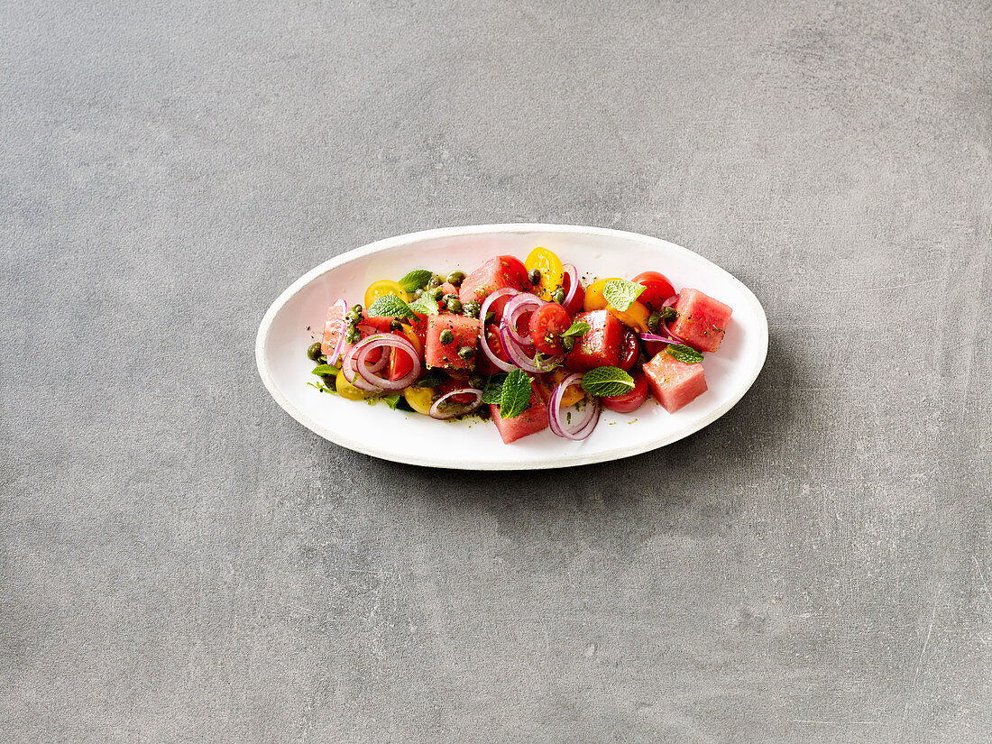 Tomato and watermelon salad with capers and mint