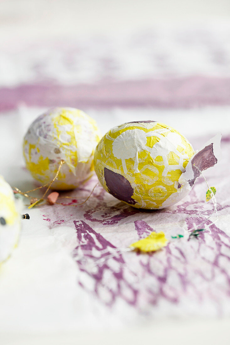 Easter eggs wrapped in colourful paper