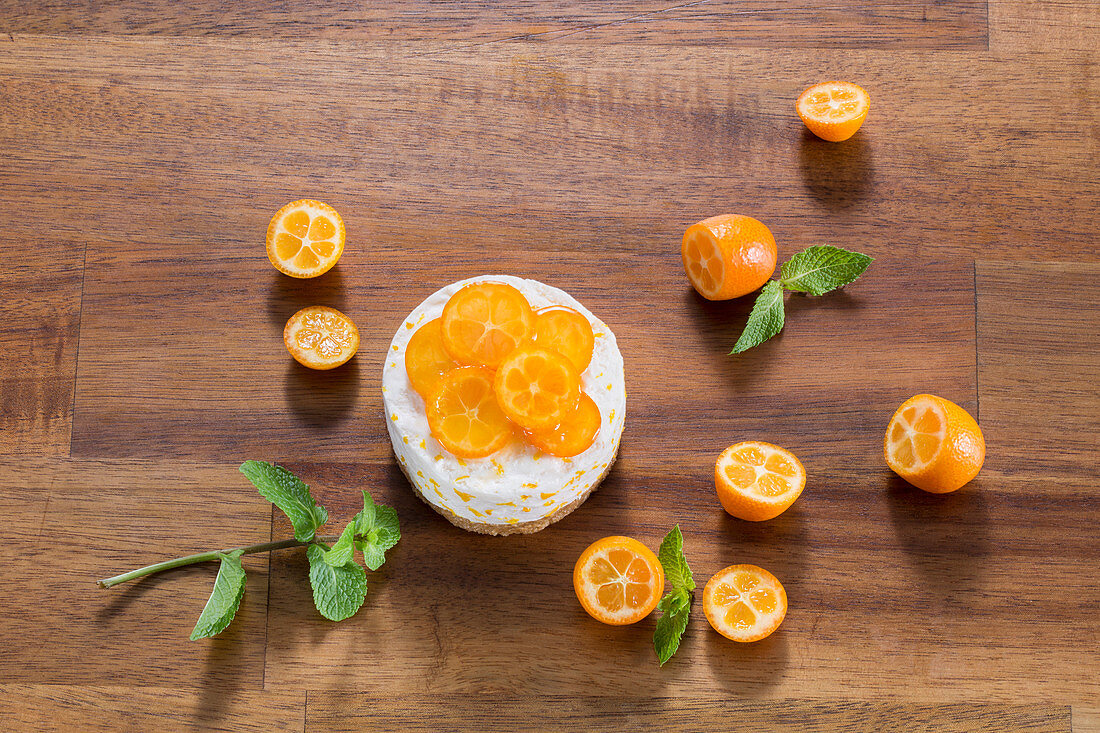 Orange tart decorated with kumquats