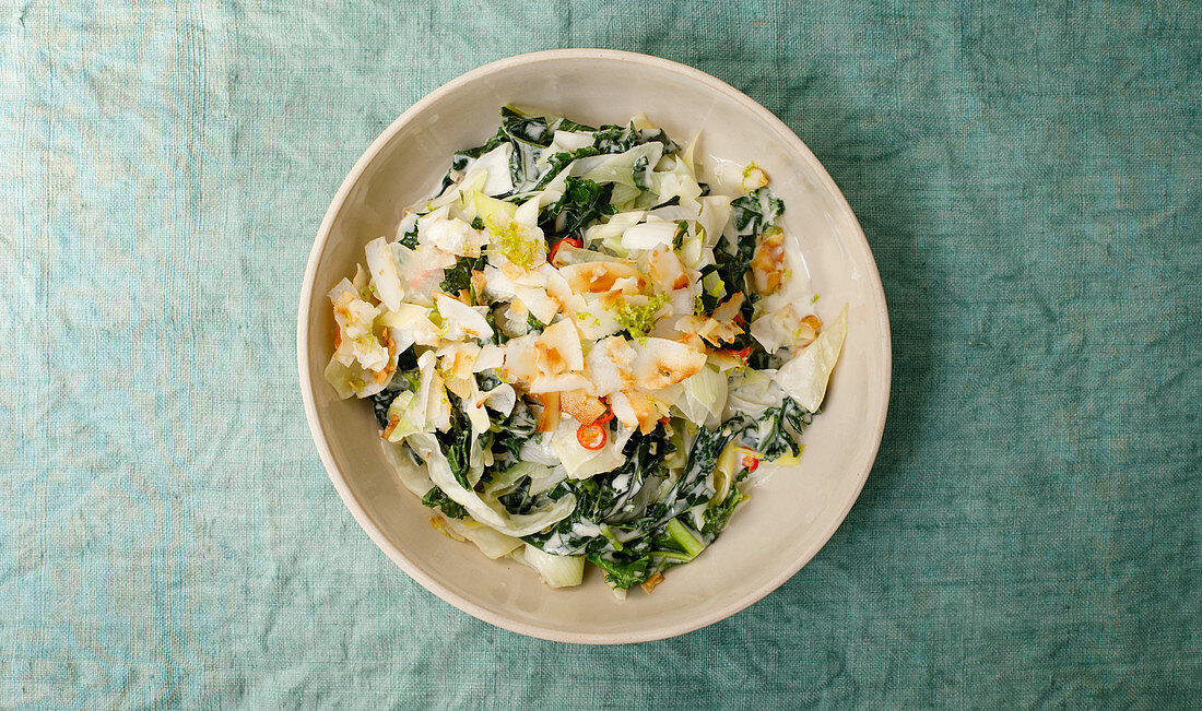 Vitamin-rich winter vegetable curry with kale and coconut