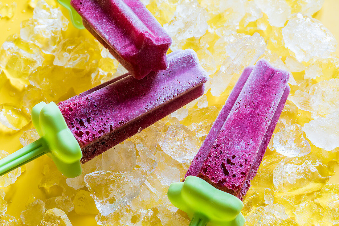 Pomegranate and raspberry ice lollies