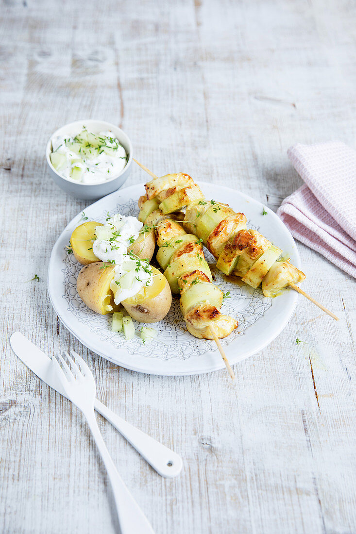 Chicken cucumber skewers with jacket potatoes and herb quark