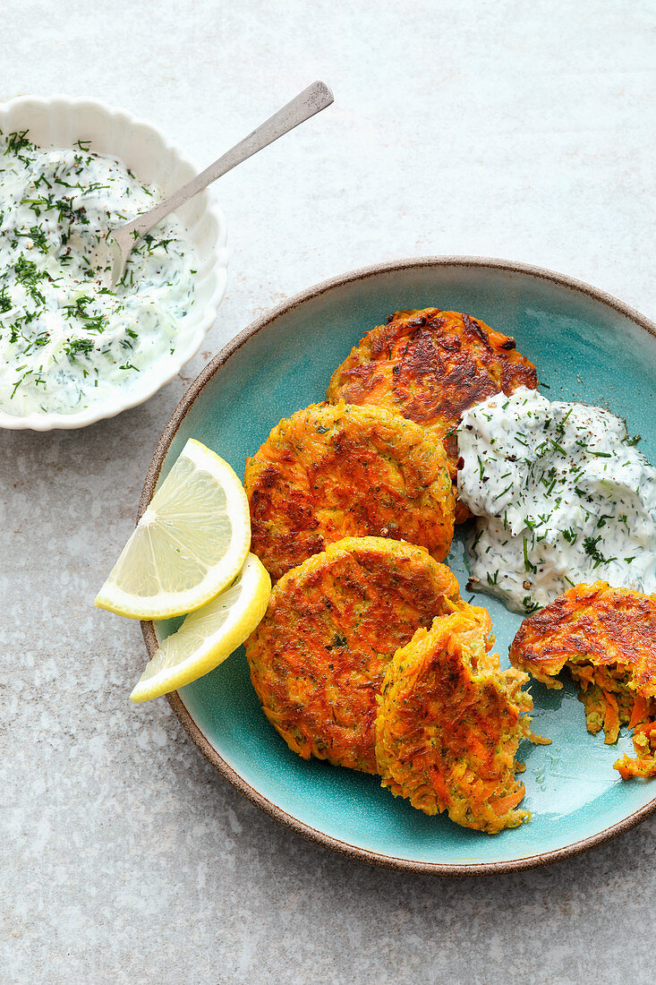 Carrot and feta cheese fritters with a cucumber dip