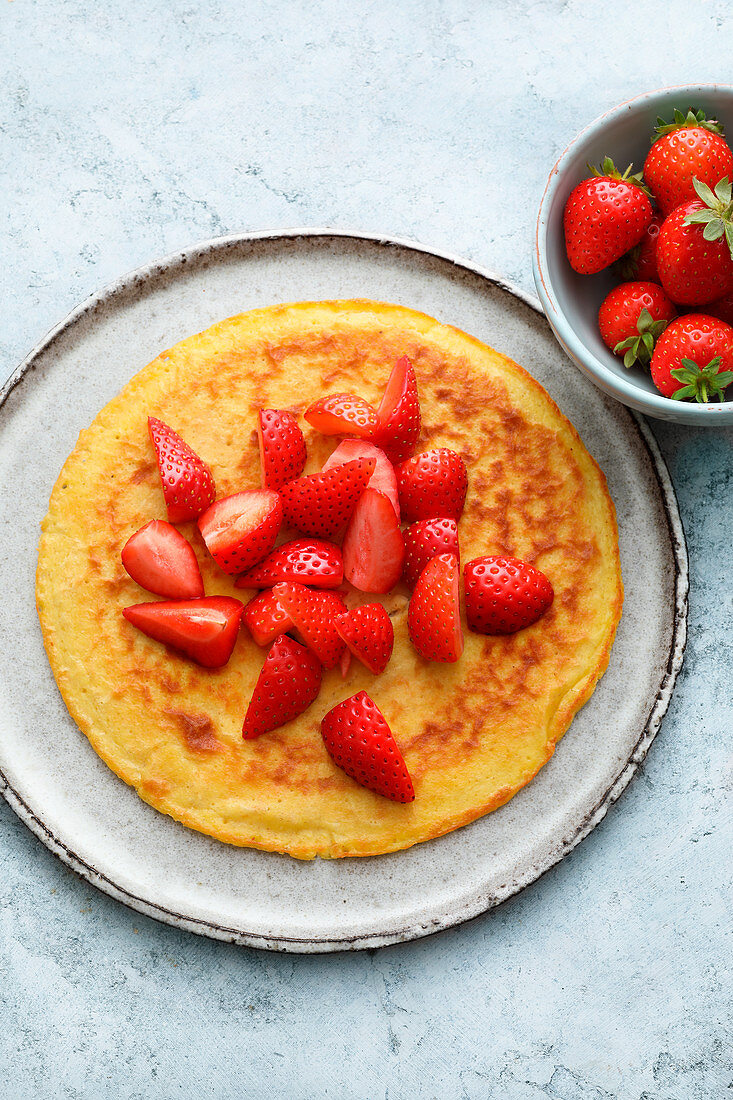 Oat pancakes with almonds and strawberries