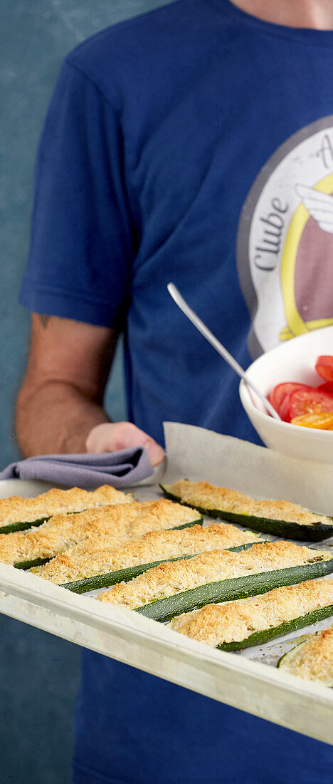 Parmesan crumble courgettes on a baking tray