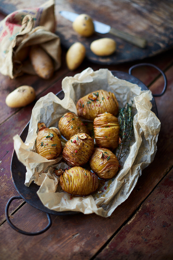 Hasselback potatoes in parchment paper