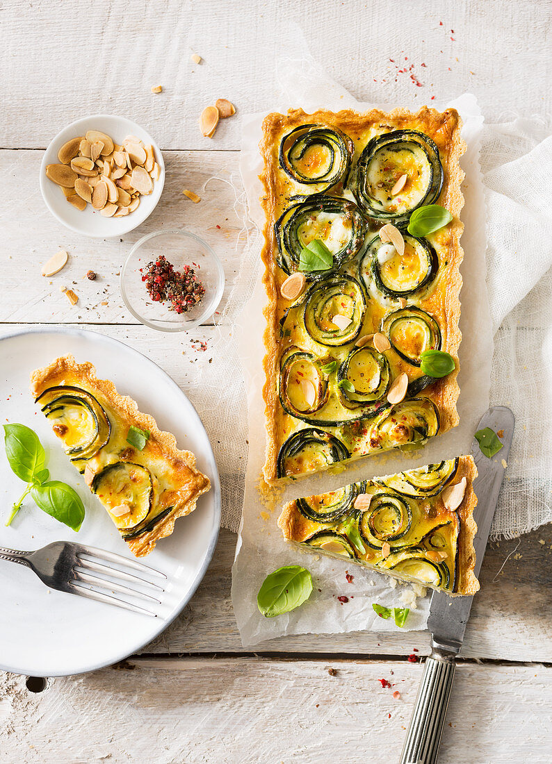 Vegetarian courgette roses and feta cheese quiche with toasted almonds