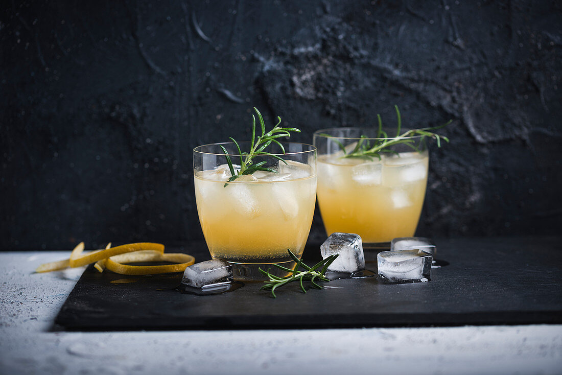 Pear and gin cocktails with rosemary