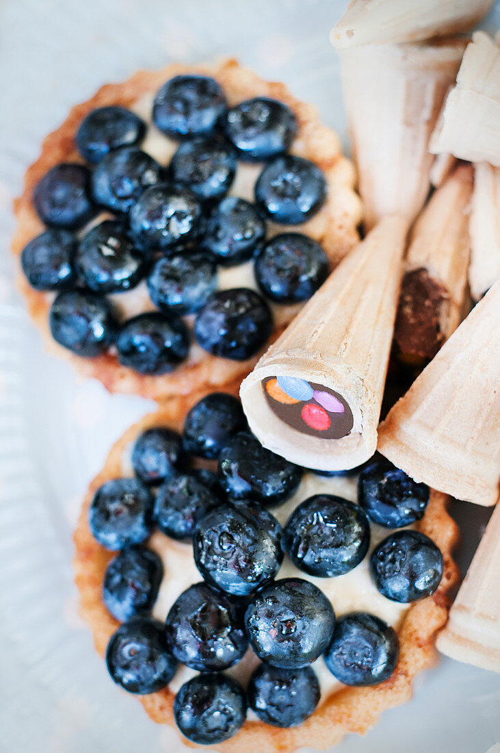 Blueberry tartlets and ice cream cones