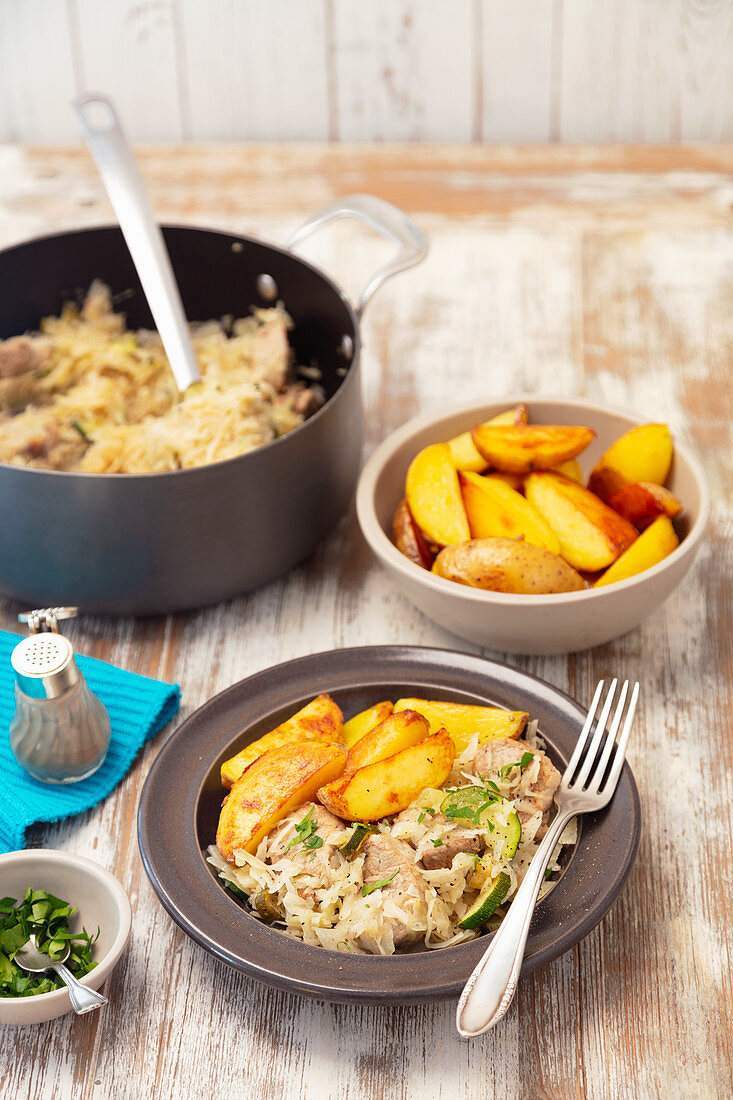 Pork loin with cabbage and baked potatoes