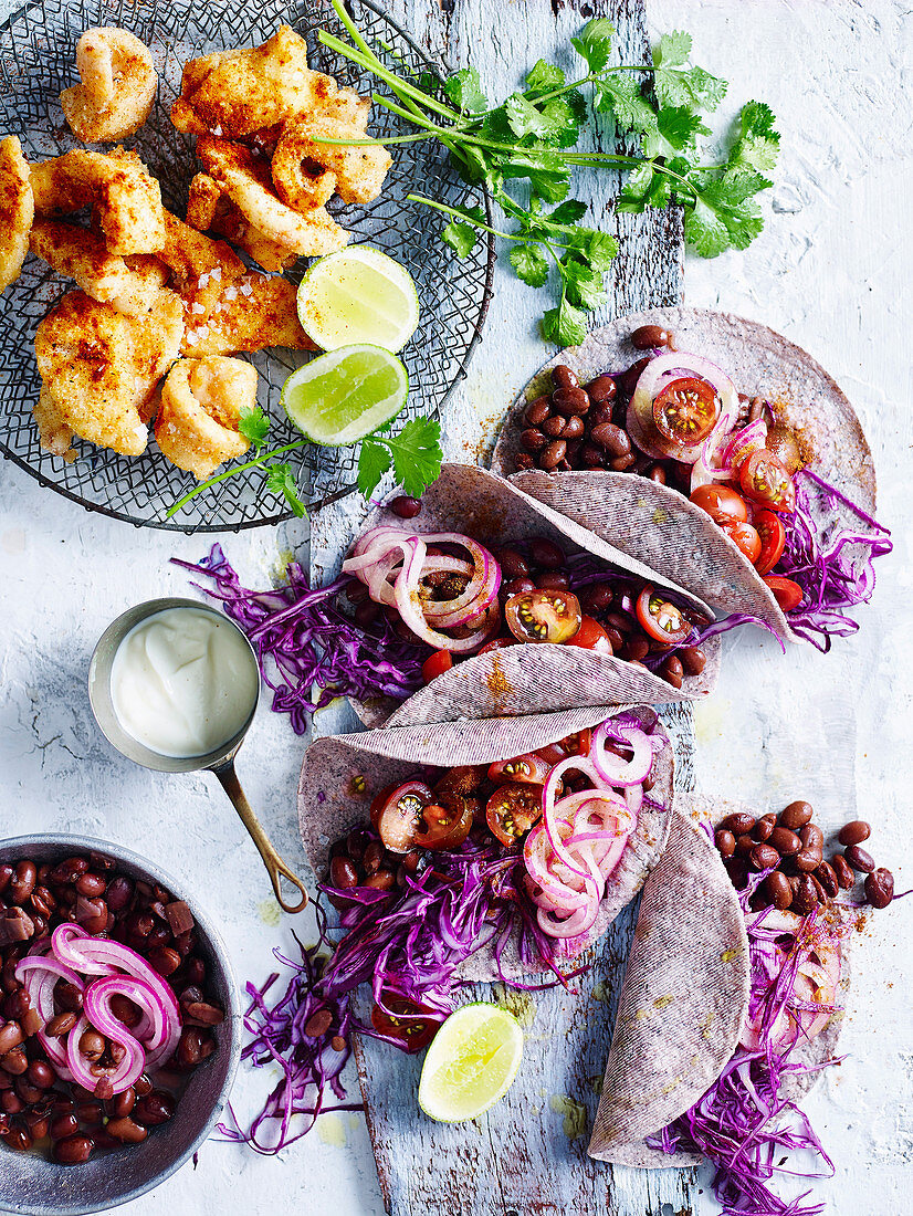 Fish and Black Bean Blue Corn Tacos with Pickled Red Onion