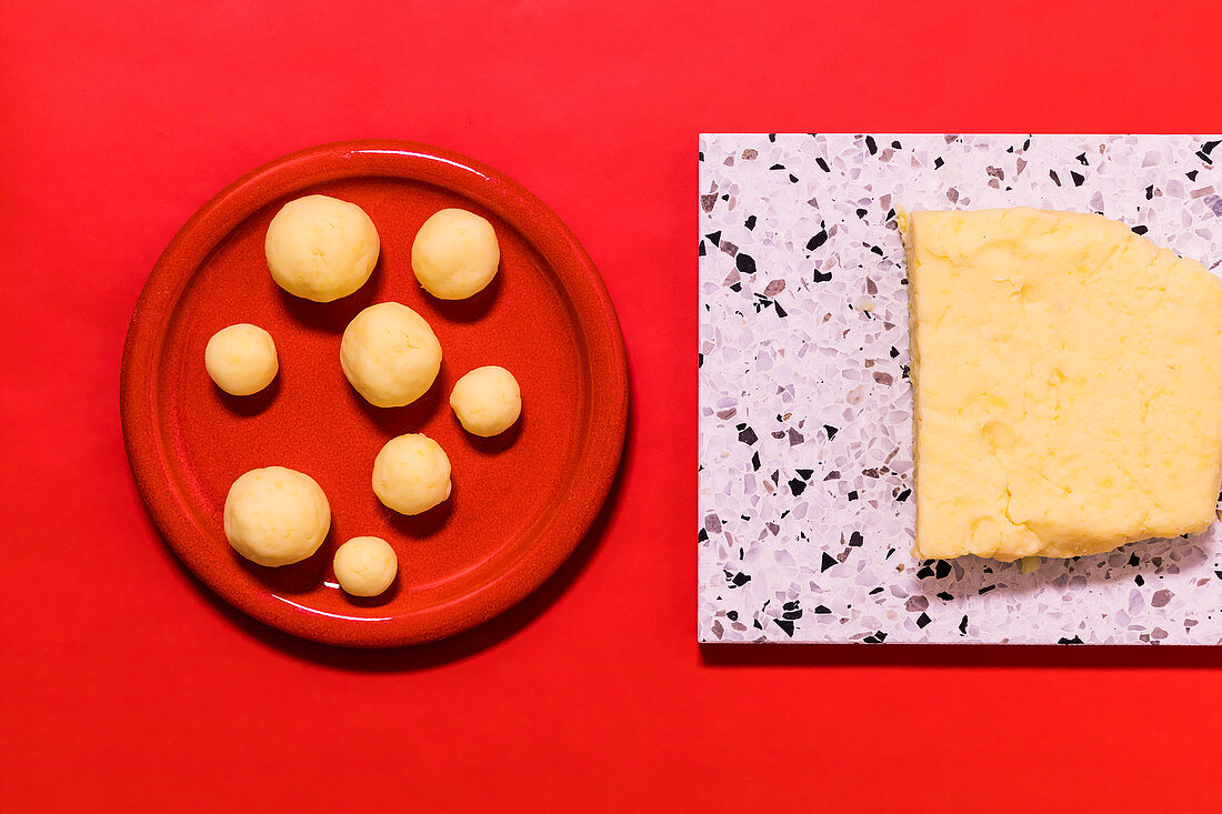 Potato dumpling dough being portioned